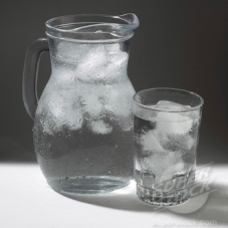 Glass and jug of ice water